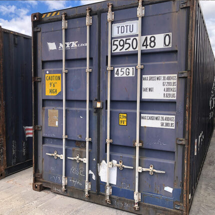 Contenedor marítimo azul de 20 pies usado para almacenamiento y transporte